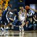 Michigan sophomore Trey Burke grabs a loose ball while a Penn State players falls on Sunday, Feb. 17. Daniel Brenner I AnnArbor.com